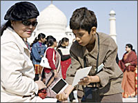 An unidentified woman and Tanay Chheda in a scene from Slumdog Millionaire